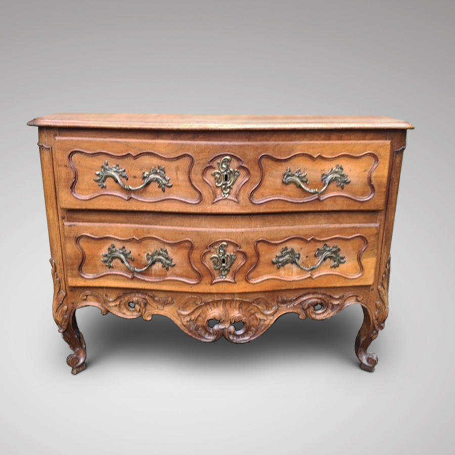 AN 18TH CENTURY  FRENCH PROVINCIAL FRUITWOOD COMMODE