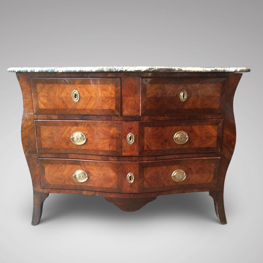 A SERPENTINE FRONTED COMMODE GERMANY C 1770