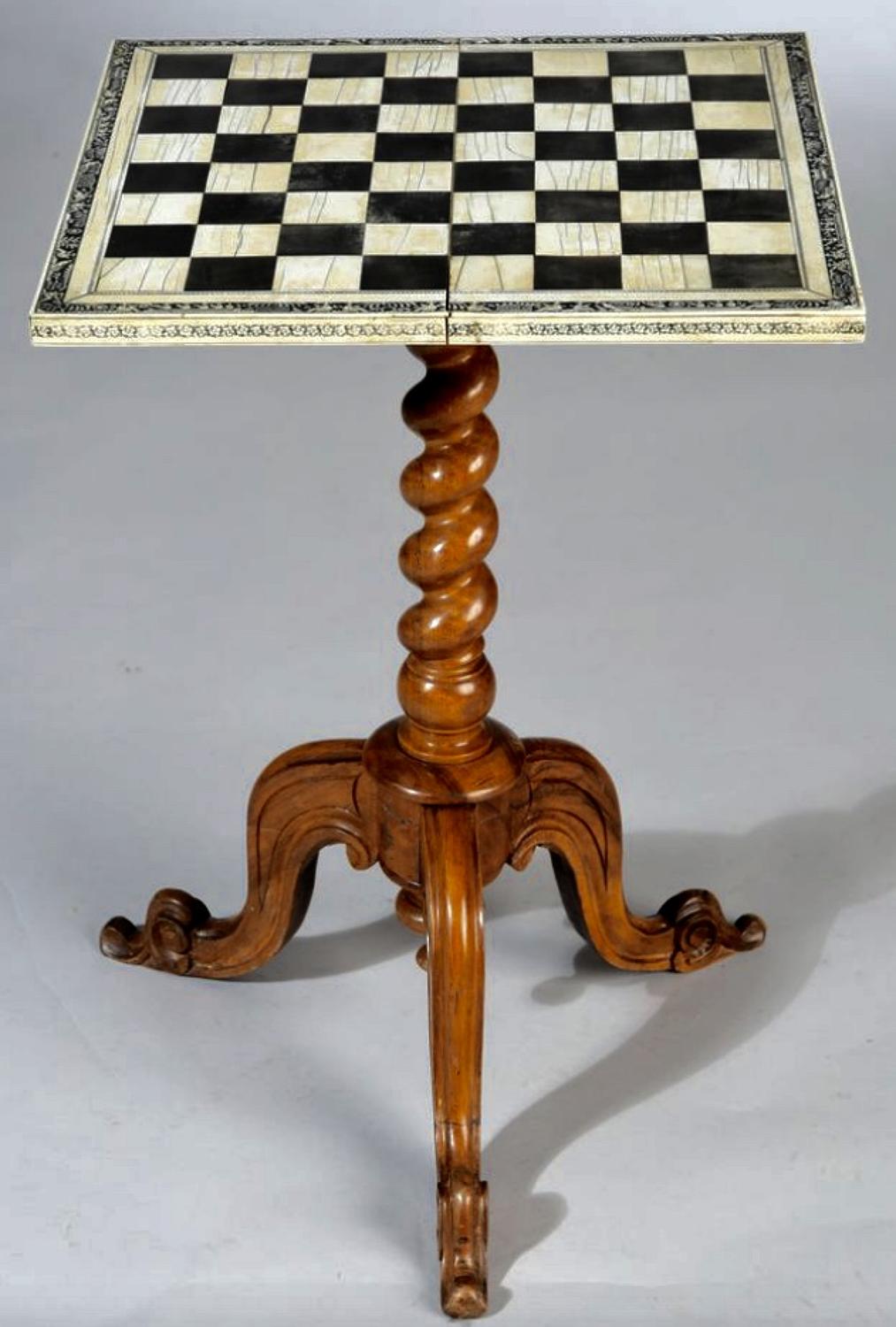 A 19TH CENTURY CHESS TABLE
