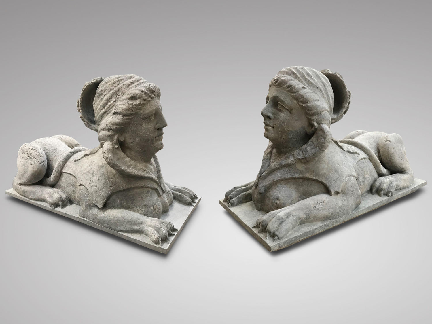 A PAIR OF STONE SPHINX