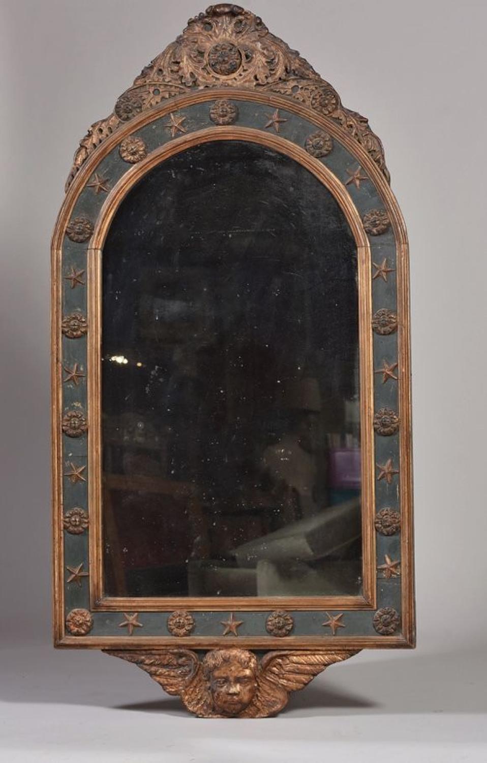 A FRENCH EMPIRE DECORATED MIRROR