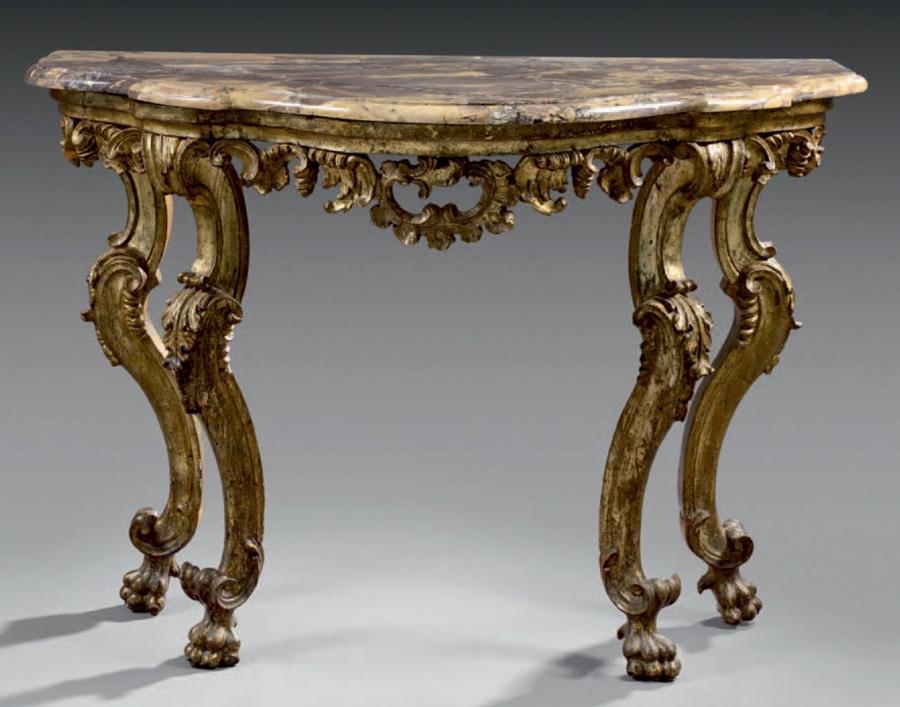 A CARVED GILTWOOD MID 18TH CENTURY CONSOLE