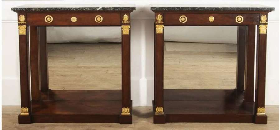 A PAIR OF FRENCH EMPIRE PERIOD CONSOLE TABLES