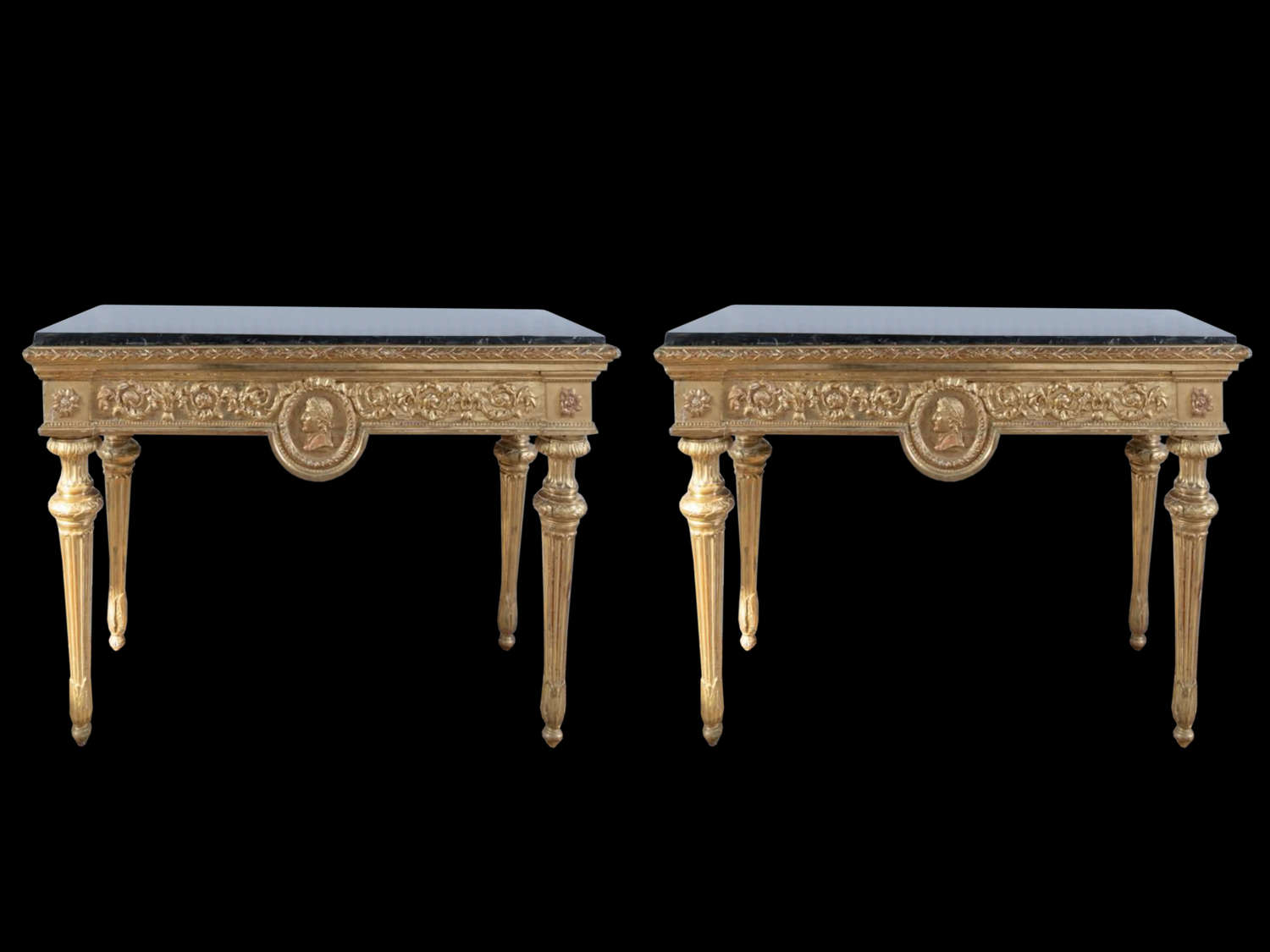 A  PAIR OF CARVED GILTWOOD CONSOLE TABLES,LUIGI XVI PERIOD C1785